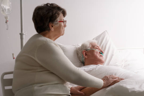 istock Wife supporting dying ill husband 800394950