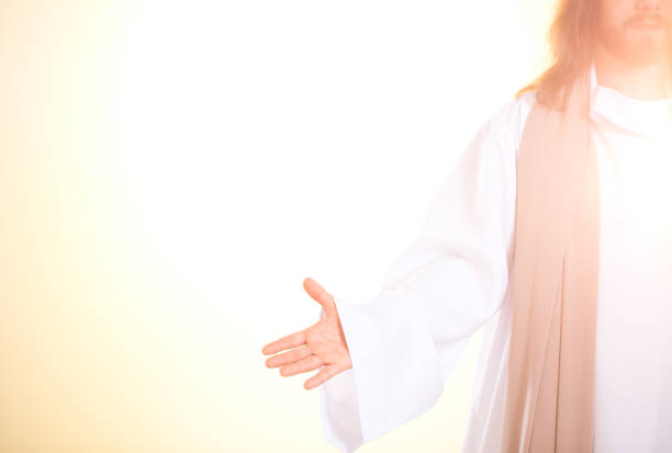Bright photo of Christ Bright photo of Jesus Christ with open arms crucifix photos stock pictures, royalty-free photos & images