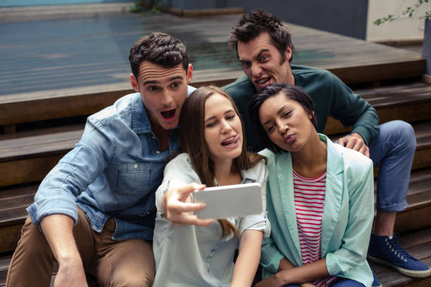 istock Happy friends taking selfie 800399180