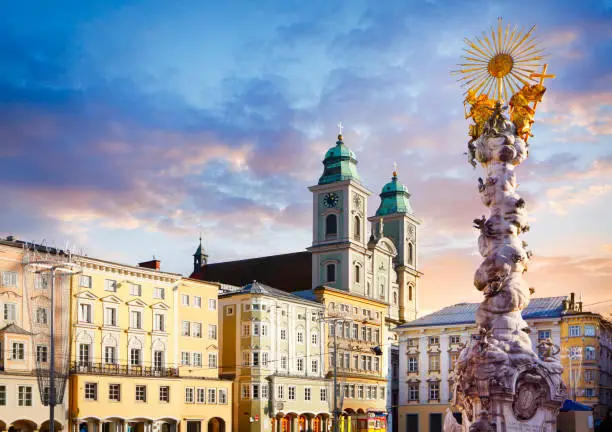 Main square in Linz with Old Cathedral (Alter Dom) and the Holy Trinity column