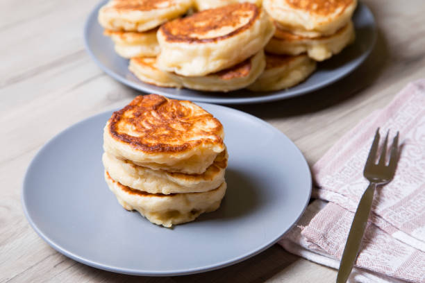 istock Fritters on kefir, yeast dough. Traditional Russian dish 800410900