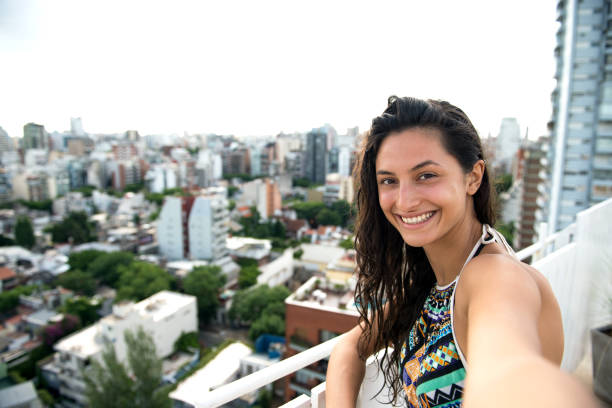 istock Beautiful woman making selfie. 800411184