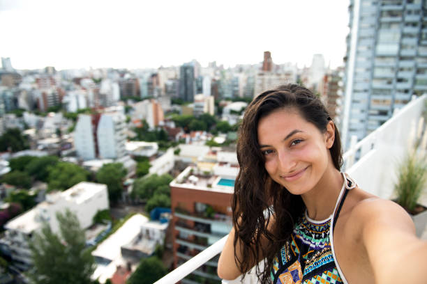 istock Beautiful woman making selfie. 800411254