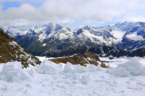 Snow ground and Majestic Zillertal, Tyrol Snowcapped mountain range panorama, Idyllic Tirol valley meadows, Austria