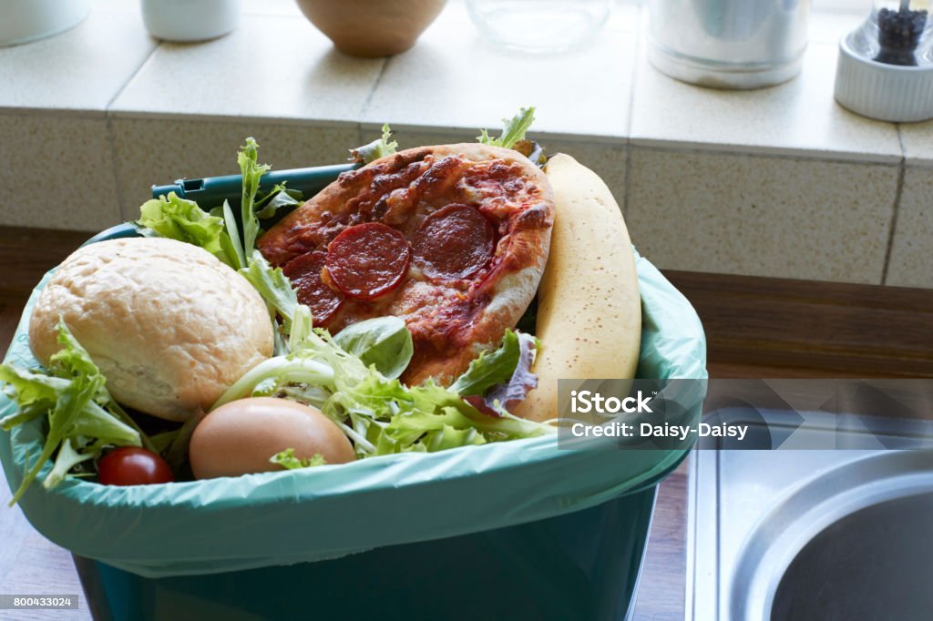 Fresh Food Waste In Recycling Bin At Home Food Stock Photo