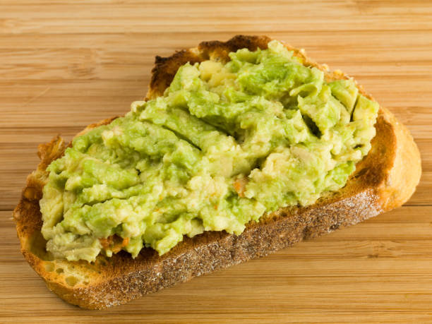 istock Avocado Pear On a Slice of Corn Bread Toast 800440932
