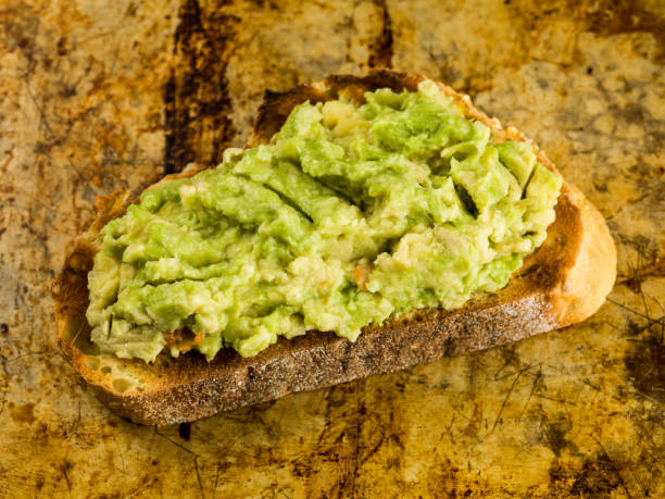 istock Avocado Pear On a Slice of Toasted Corn Bread 800441180