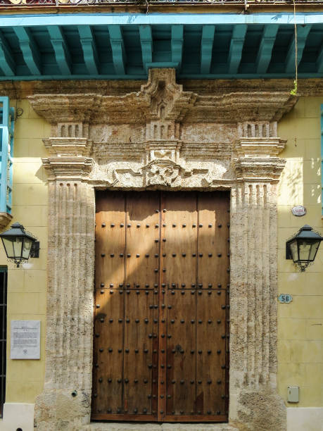 Havana, Cuba - March 19, 2017: the entrance door of a typical colonial house on the streets of old Havana, Cuba