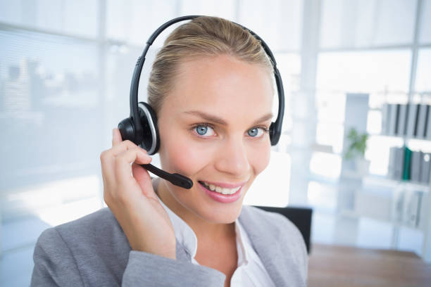 istock Businesswoman wearing a work headset 800444586