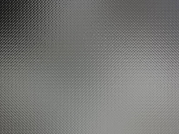 istock Carbon fiber with light reflections and glows 800444808