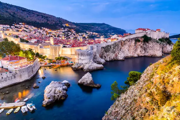 Dubrovnik, Croatia. Spectacular twilight picturesque view on the old town of Ragusa from the Lovrijenac Fortress.