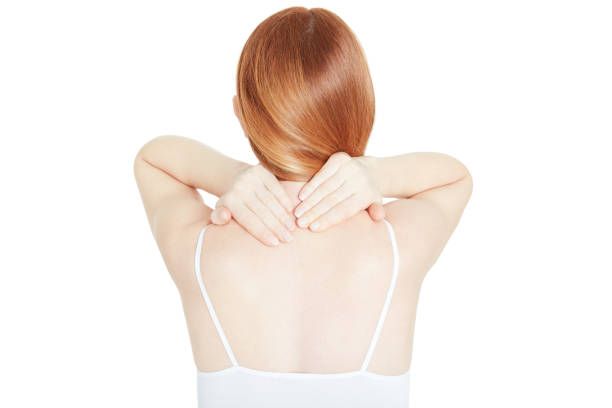 istock Woman holding both hands on painful neck on white, clipping path 800461484