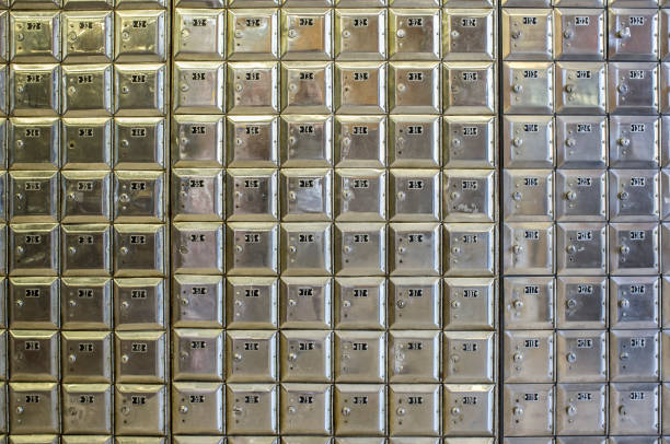 istock Wall full of rows of metal post office boxes 800464530