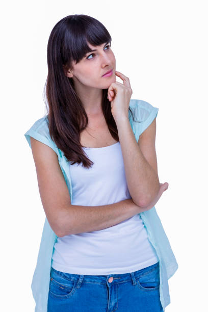 istock Pretty hipster with finger on chin looking away 800472352