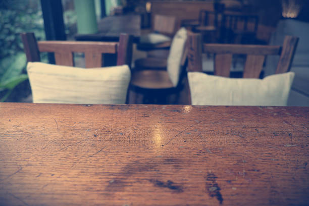 istock Top of empty wood table with Bar Cafe Restaurant blurred background, product display template, Business presentation 800476808