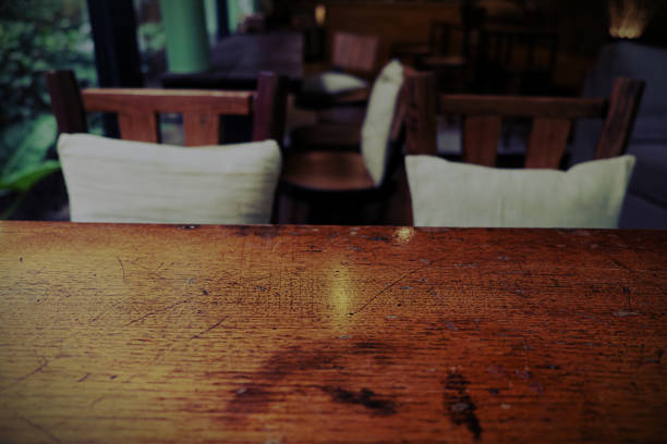 istock Top of empty wood table with Bar Cafe Restaurant blurred backgro 800476846