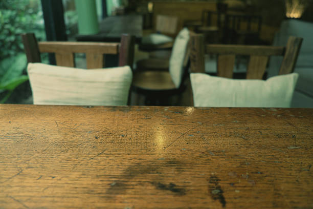 istock Top of empty wood table with Bar Cafe Restaurant blurred backgro 800476864