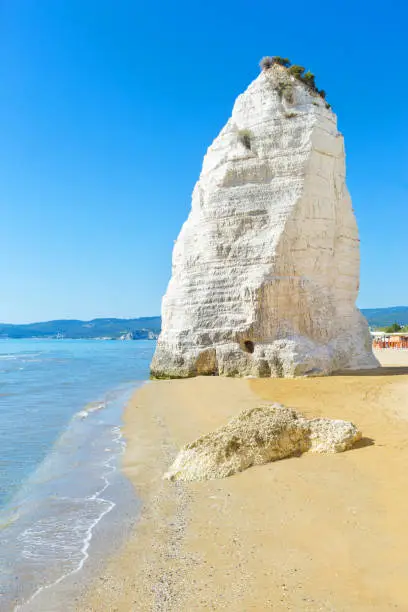 Beach of Pizzomunno rock, in Vieste, Gargano coast, Apulia, South of Italy