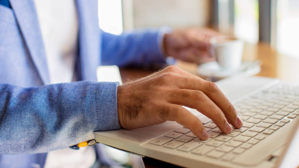 istock Typing on laptop keyboord close up 800501626