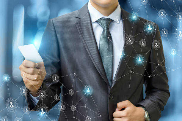istock Businessman is holding the payment card . 800551804