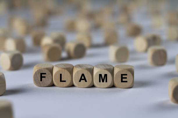 istock flame - cube with letters, sign with wooden cubes 800604144