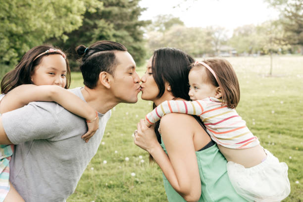 istock Happy family having fun outdoor 800678112