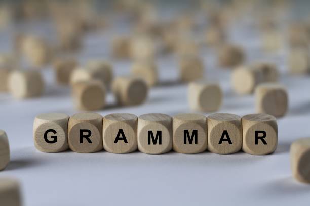 istock grammar - cube with letters, sign with wooden cubes 800715082