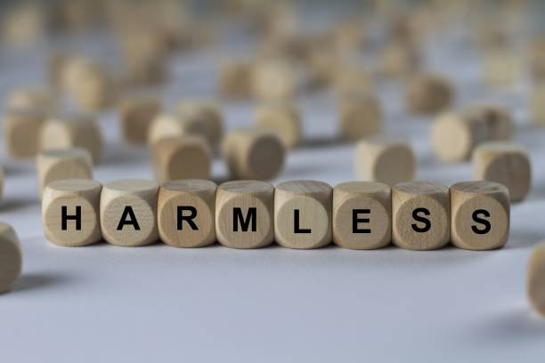 istock harmless - cube with letters, sign with wooden cubes 800756906