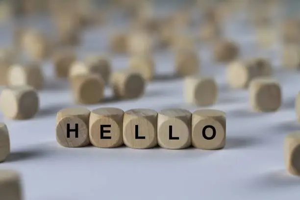 Photo of hello - cube with letters, sign with wooden cubes