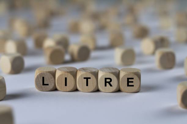 istock litre - cube with letters, sign with wooden cubes 800840578