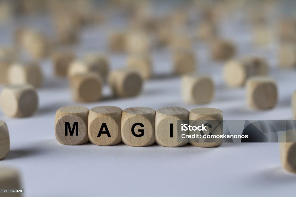 magic - cube with letters, sign with wooden cubes series of images: cube with letters, sign with wooden cubes Abstract Stock Photo