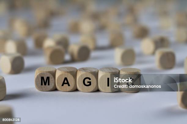 Magic Cube With Letters Sign With Wooden Cubes Stock Photo - Download Image Now - Abstract, Art, Brick