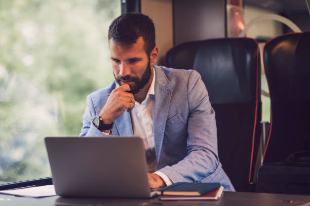 istock Businessman working and traveling by train 800845246
