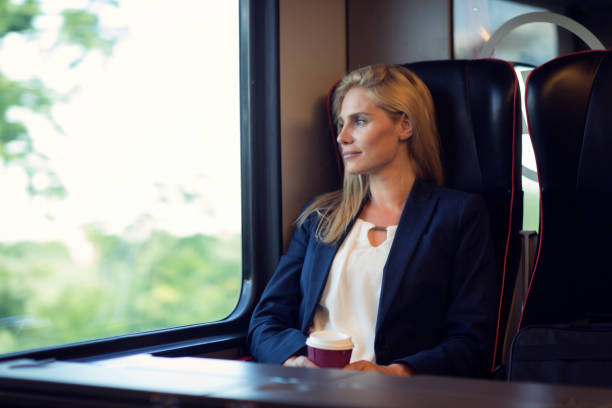 istock Businesswoman in the train 800845454