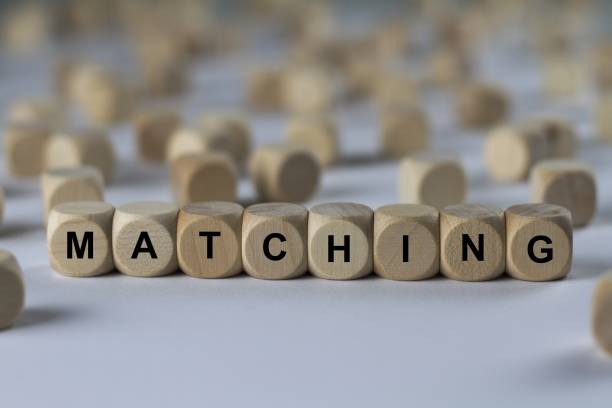 istock matching - cube with letters, sign with wooden cubes 800845572