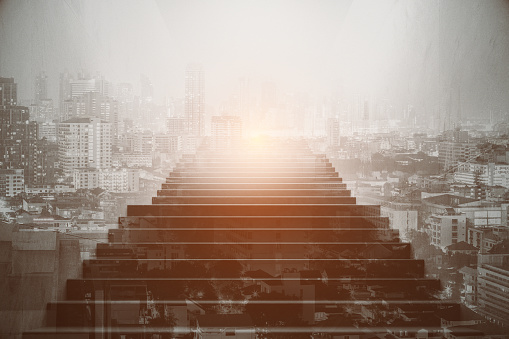 Front view of staircase on abstract bright city background. Success concept. Double exposure