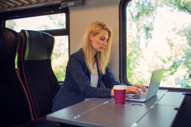 istock Businessman working and traveling by train 800852280