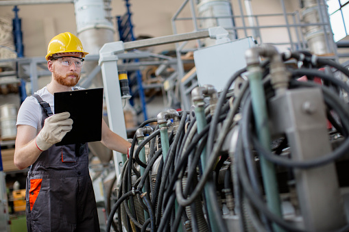 Machine Controlling Machine Controlling Machine Work In Factory Stock Photo - Download Image Now ...