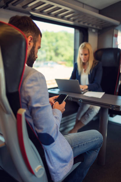 istock Business people working in the train 800860640
