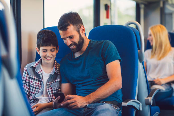 istock Family traveling by train together 800866950