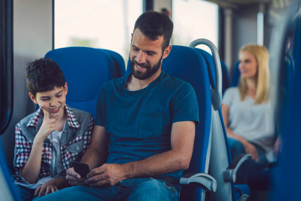 istock Family traveling by train together 800866952