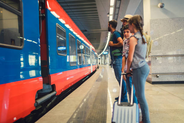 istock Family traveling by train together 800871950