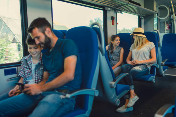 istock Family traveling by train together 800874474