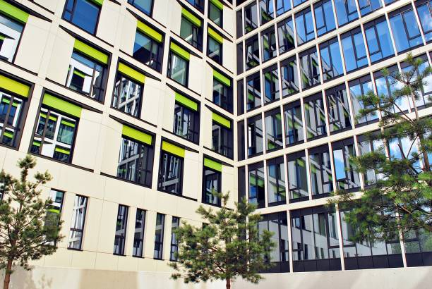 istock Modern building.Modern office building with facade of glass 800874740