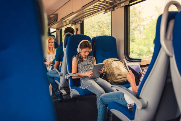 istock Family traveling by train together 800880994