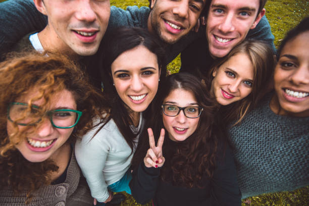 istock friends take a selfie all together 800881212