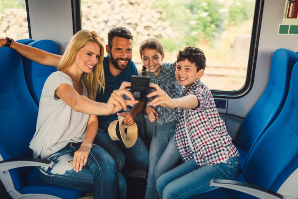 istock Family traveling by train together 800883646