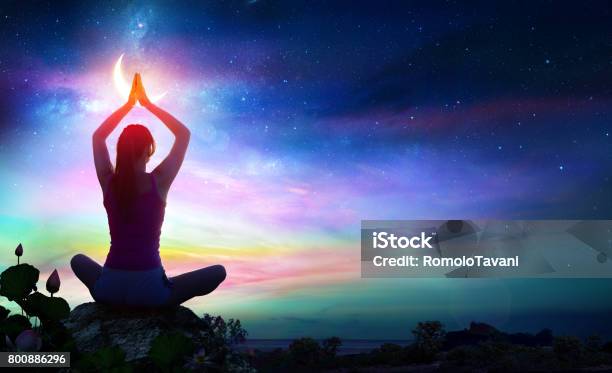 Woman Doing Yoga Spiritual Contemplation Stock Photo - Download Image Now - Chakra, Meditating, Zen-like