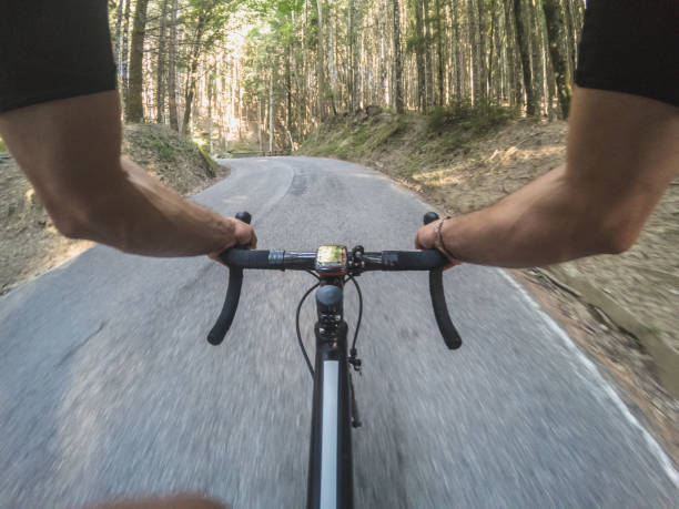 istock Cycling on a mountain road. POV 800894744