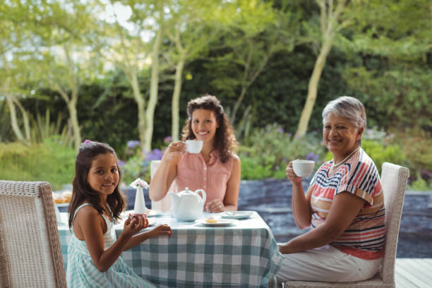 istock Happy family having tea 800934118